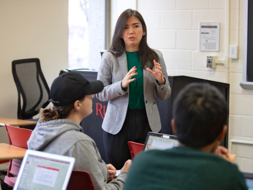 A professor teaching her class