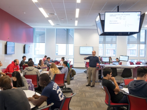 Faculty teaching students in a classroom